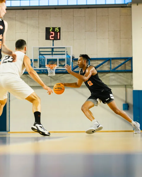 Jacob Huggins playing basketball in Italy